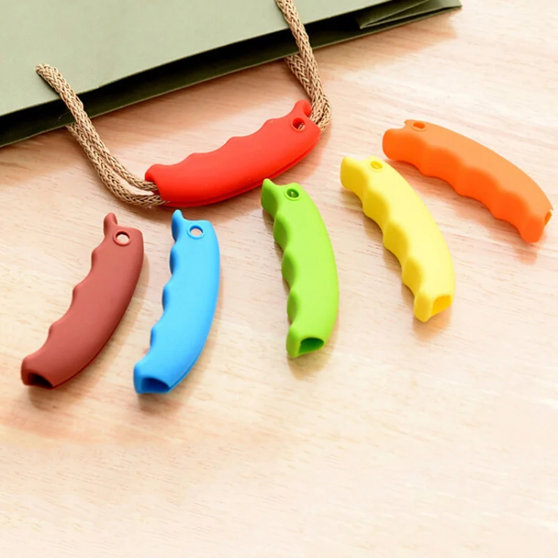 

1pc Candy Color Bag Carrying Handle Tool Silicone Knob Relaxed Grips Carry Shopping Handle Bag Clips Handler Kitchen Tool 2019