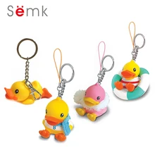 

Semk Anime Figure Duck Keychain PVC Action Figure Mini Dolls Swimming Suit Car Key Chain Bag Trinket Gift for Women Girl