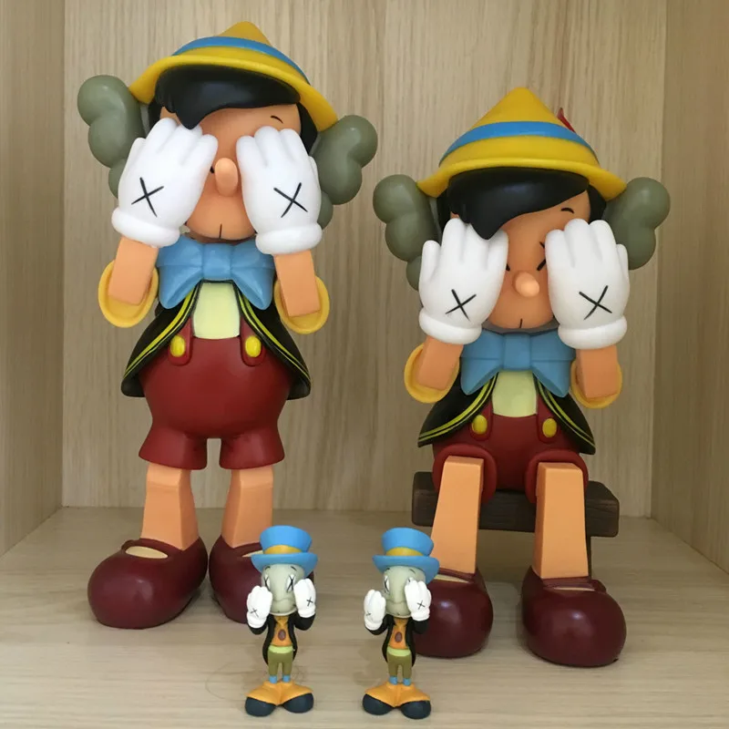 

Hot OriginaFake Kaws Companion Medicom Pinocchio&Jiminy Cricket Standing/Sitting PVC Anime Action Figures Creative Gift L342