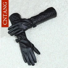 Dlouhé dámské rukavice s mašličkou ze syntetické kůže