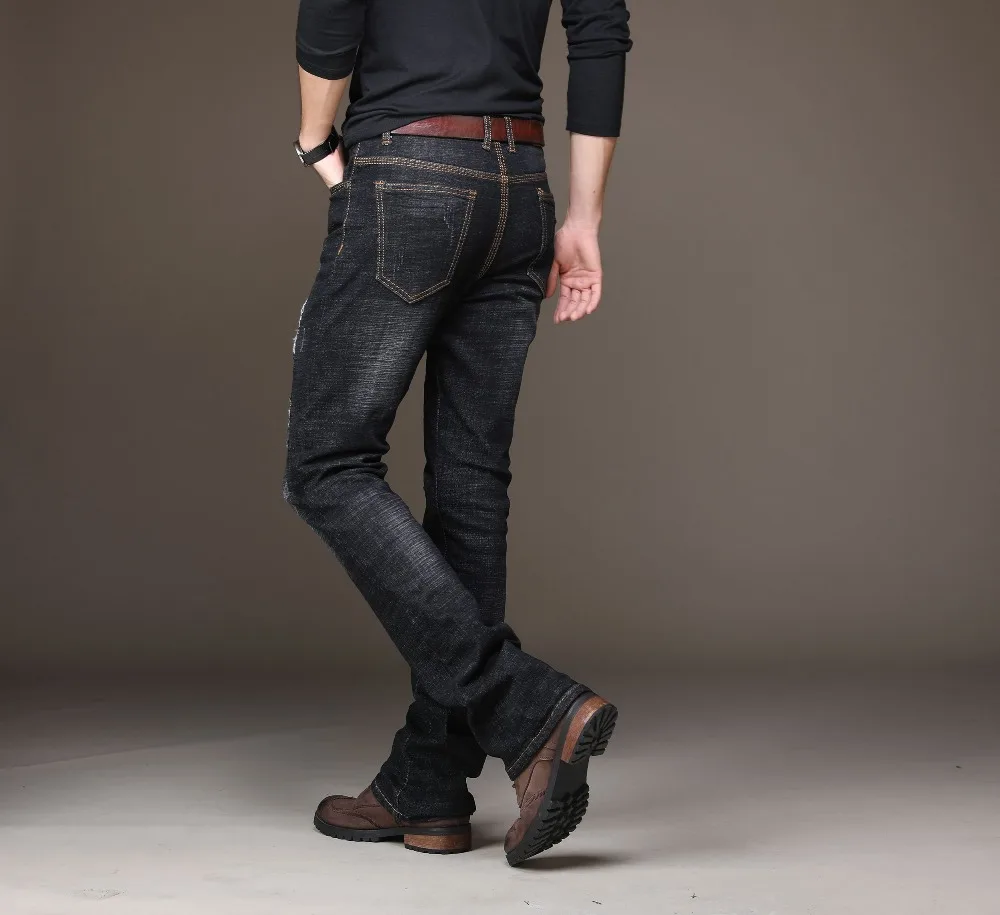 black ripped bootcut jeans