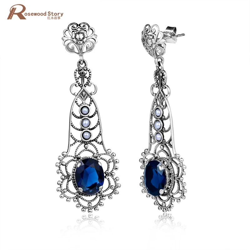 

Fashion Earrings Hollow Out 925 Sterling Silver Flower Natural Pearls Earrings Blue Rhinestone Crystal Dorp Earrings For Women