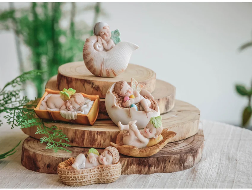 

Cute Sleeping Baby Statue Wings Angel Elf Flower Fairy Mini Statue Collection Resin Crafts Creative Gift Free Shipping
