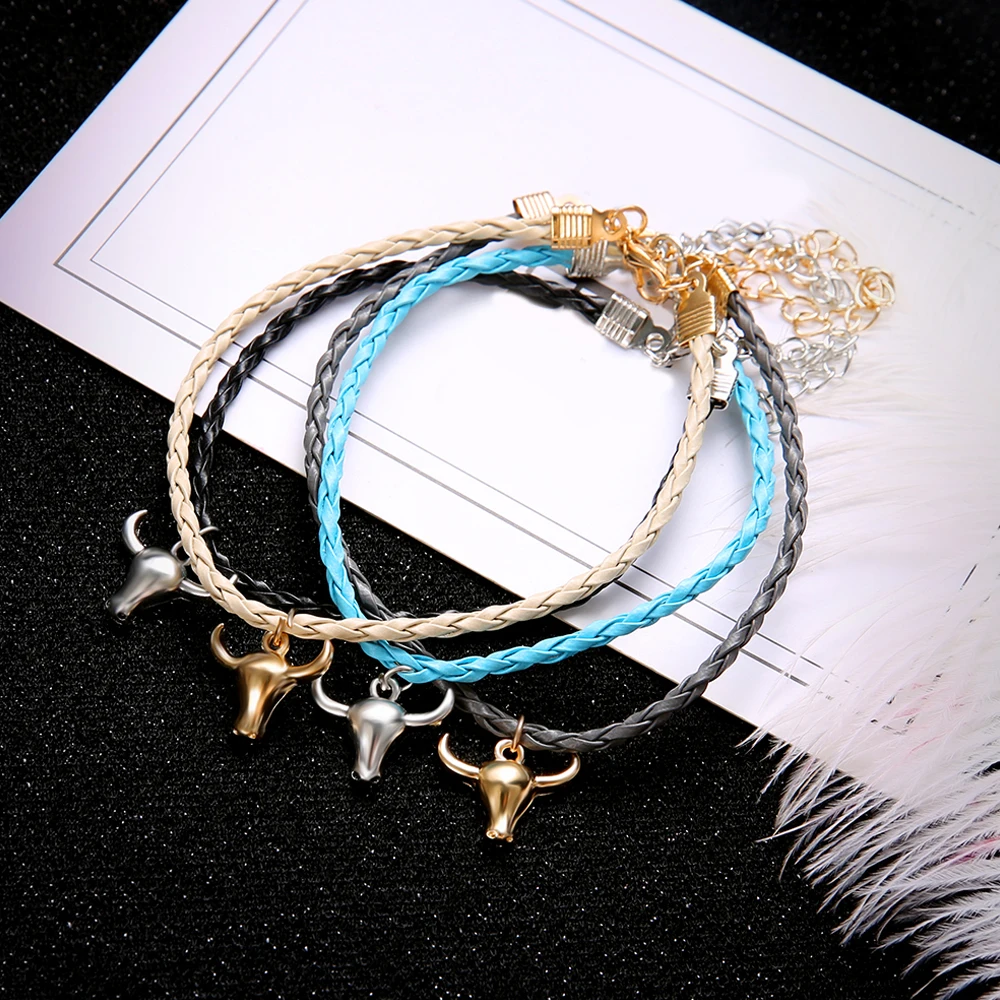 4-unids-set-cabeza-de-toro-Taux-de-cuero-de-la-PU-multicapa-pulseras-para-hombres (3)