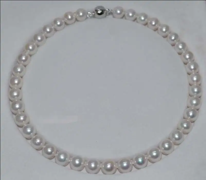 

FREE SHIPPING HOT sell new Style >>>>Outstanding luster Natural Rare white 11mm round Cultured Pearl NecklaceJ8432