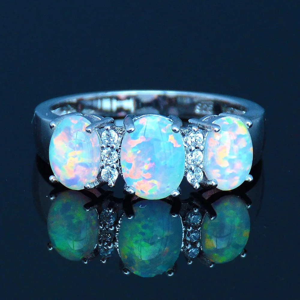 Graceful Ocean Blue Fire Opal Ring with Brilliant Cubic Zirconiain