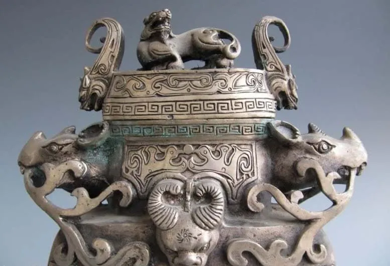 

Chinese Classic Silver Evil beast Bull Ox Head God Zun flask Crock Pot Vase