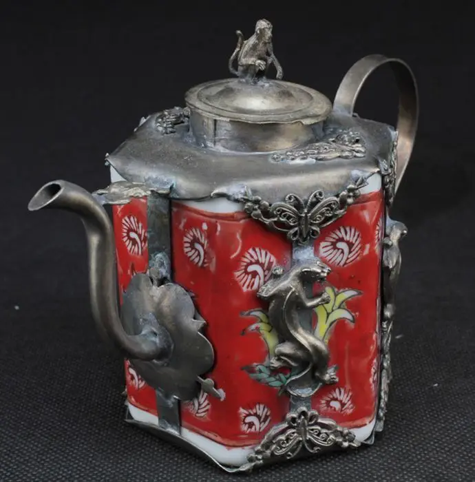 

China Ceramic inlaid with copper and brave monkey's teapot lid
