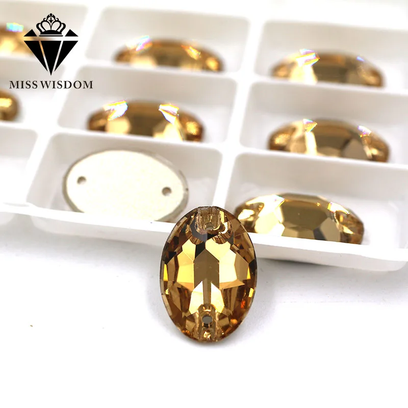 

New high quality flatback glass double hole sew on rhinestones Oval shape Light smoke yellow crystal rhinestone diy accessories