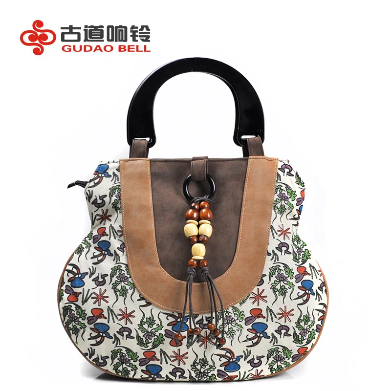 

minority Ethnic style women's handbag totes Tassel new pu leather + canvas women's wholesale and retail Beautiful feminine charm