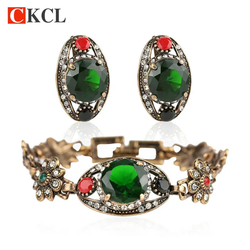 Комплект из двух сережек и браслета золотистого цвета|green jewelry set|fashion setjewelry sets |
