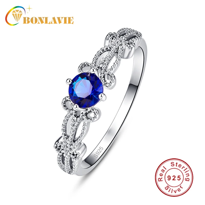 

BONLAVIE 100% 925 Sterling Silver Retro Flower Hollow Cut Blue Crystal Stone Finger Ring for Women Sterling Silver Jewelry