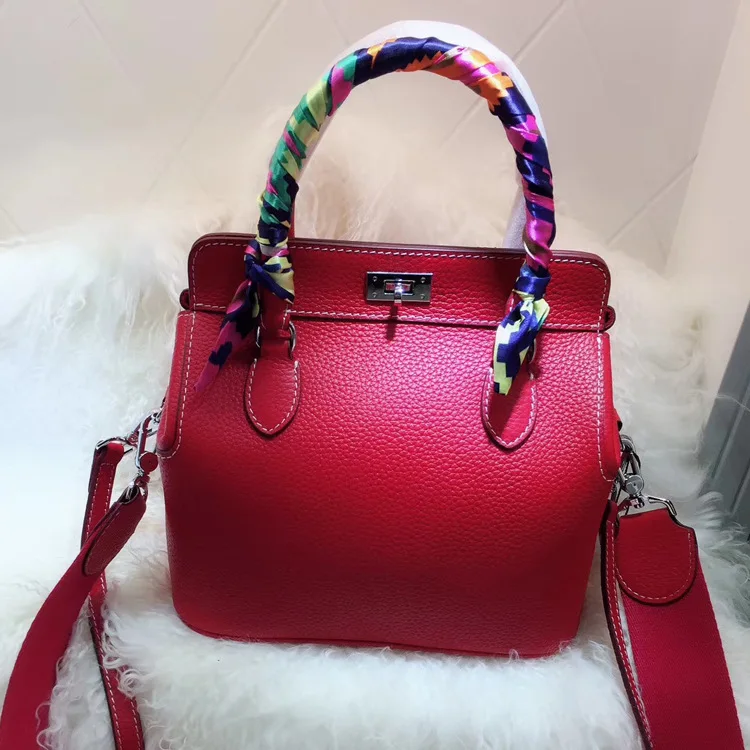 Women's new leather lychee pattern bag Europe and the first layer of leather doctor bag dumpling-type milk box package