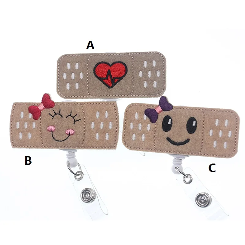 

100pcs/lot cute handmade felt cute smile face bow/heart big band Aid Retractable medical nurse id badge holder/reel for gift