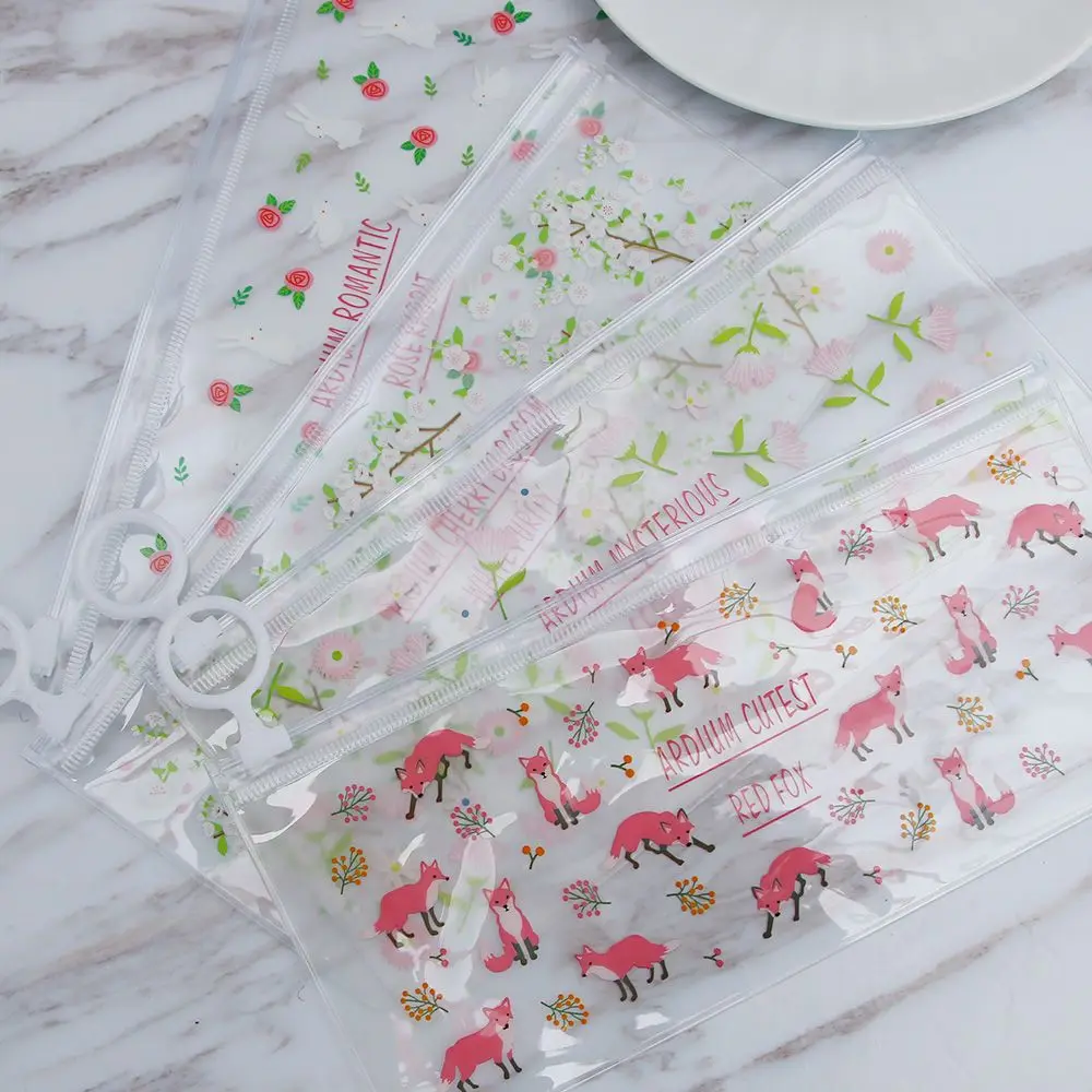 

ISKYBOB 1pcs Newly Mini travel makeup bag Cute Rabbit Fox Flower small cosmetic tote bag Unisex PVC Purse Pouch Transparent Bag