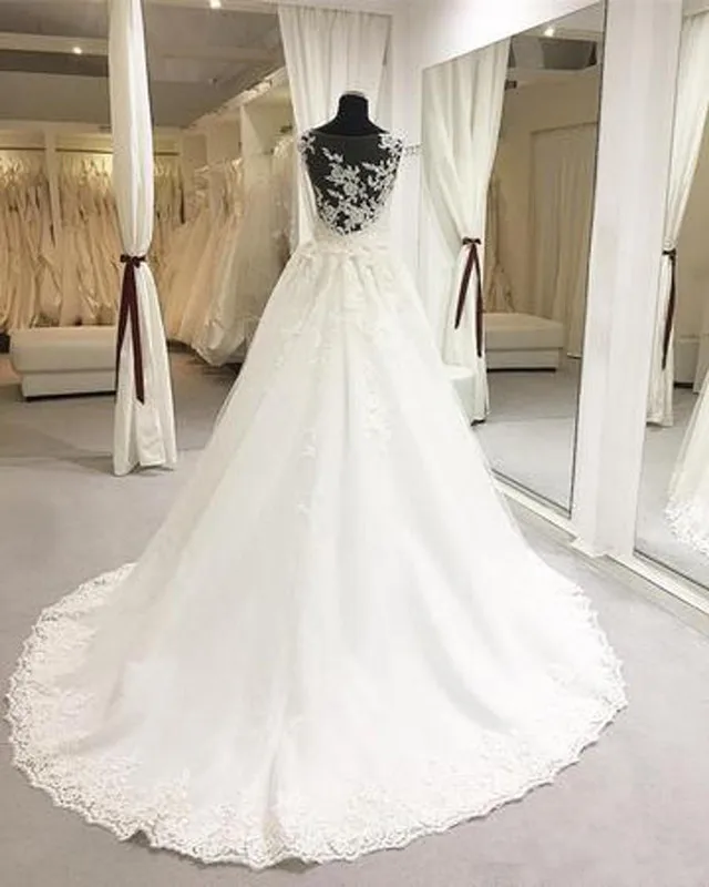 fresh-illusion-bodice-wedding-dresses-elegant-sheer-lace-appliques-neckline-court-train-princess-backless-mopping-long-section-wedding%C2%A0gowns (1)