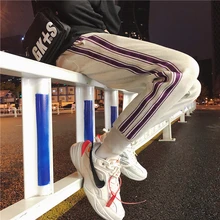 Fashion Casual Men's Pants Pants Spring And Autumn New M-2XL Stripes Loose Harem Pants Tricolor Personality Youth Popular Fashion Casual Men's Pants Pants Spring And Autumn New M-2XL Stripes Loose Harem Pants Tricolor Personality Youth Popular