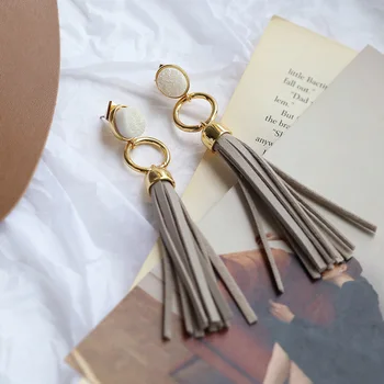 

European and American designer style leather tassels Earrings female fashion temperament circular tassels long earrings