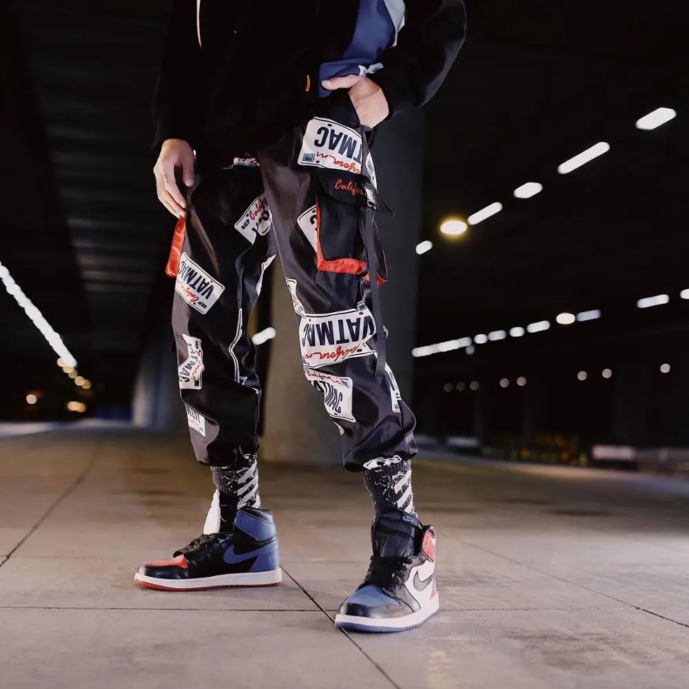 

New Brand Autumn Hip Hop Fashion Harajuku Big Pocket joggers Letters Bottom-tied Overalls Casual Polyester Elastic Waist Pants