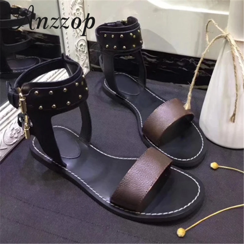 

2019 new chic sandals female summer trend simple wild elegant thick bottom word buckle flat beach sandals explosion models