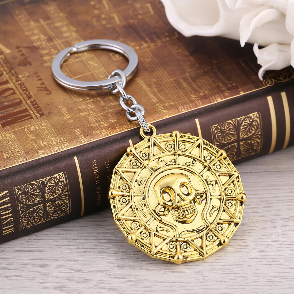 

2016 Pirates of the Caribbean Keychain Skeleton Pendants Keychains Gold Key Chain Chaveiro Key Ring High quality Jewelry