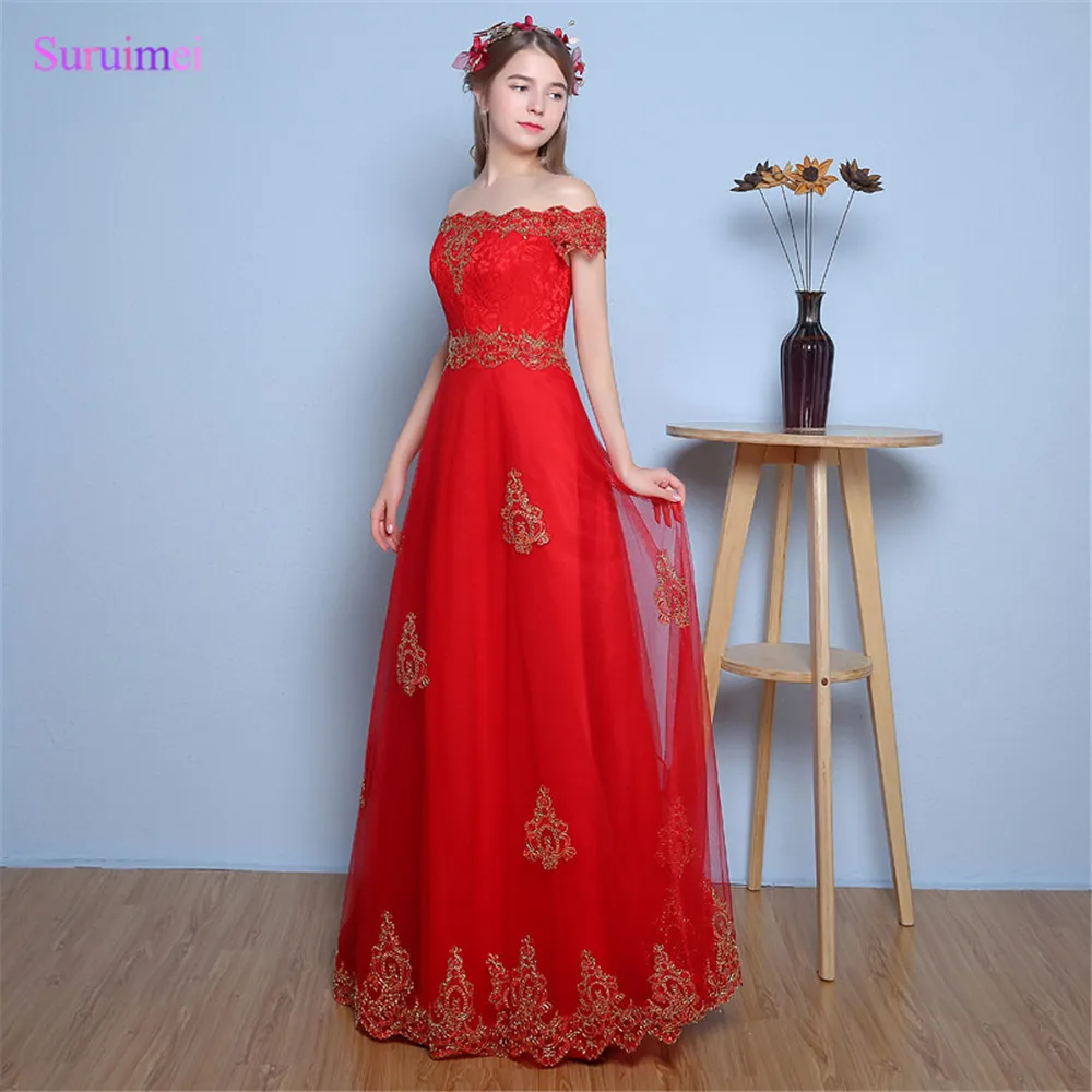 red and gold gown with sleeves