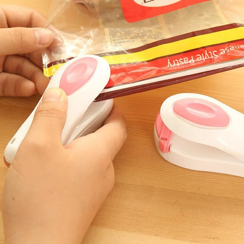 

New Portable Mini Heat Sealing Machine Impulse Sealer Seal Hand Held Packing Plastic Bag Food Sealer (Color: Pink) apdc11c96