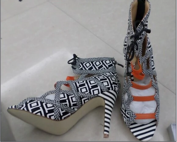

2016 Fashionable geometric shaped black & white print featuring caged cut out design lace up with rear zipper gladiator sandals
