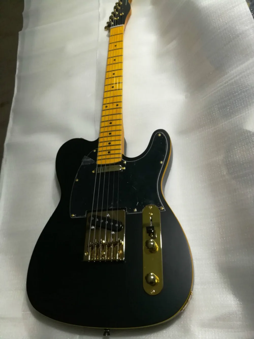 

High Quality GYTL-2013 Matte Black solid body black pickguard black headstock Gold hardware Electric Guitar, Free shipping