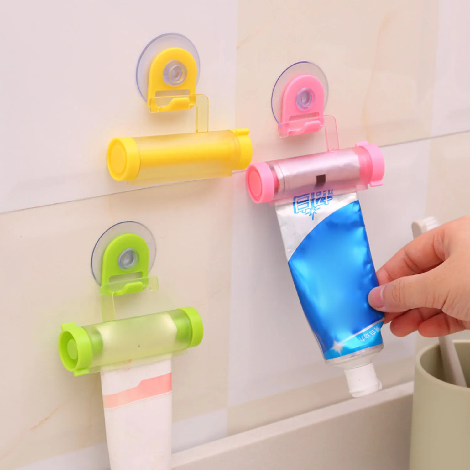 

Behogar 2pcs Manual Rolling Toothpaste Dispenser Tube Squeezer Sucker Holder Hanger Gadget Bathroom Accessories Random Colors