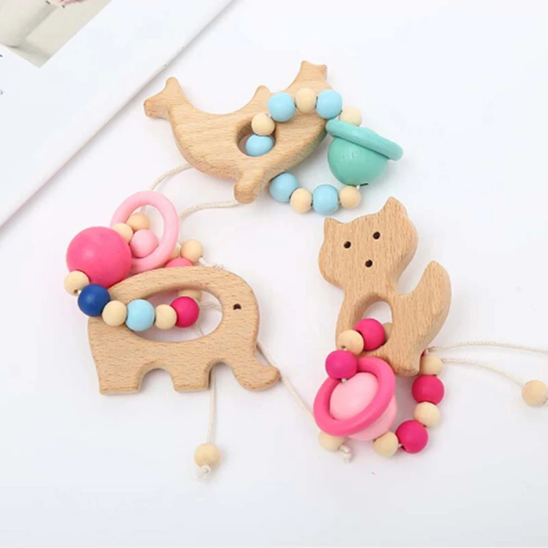 

Wooden Teether Crochet Chew Beads Teething Baby Nursing Bracelets Wood Cartoon Animal Rattles Toys Teether Montessori Bracelets