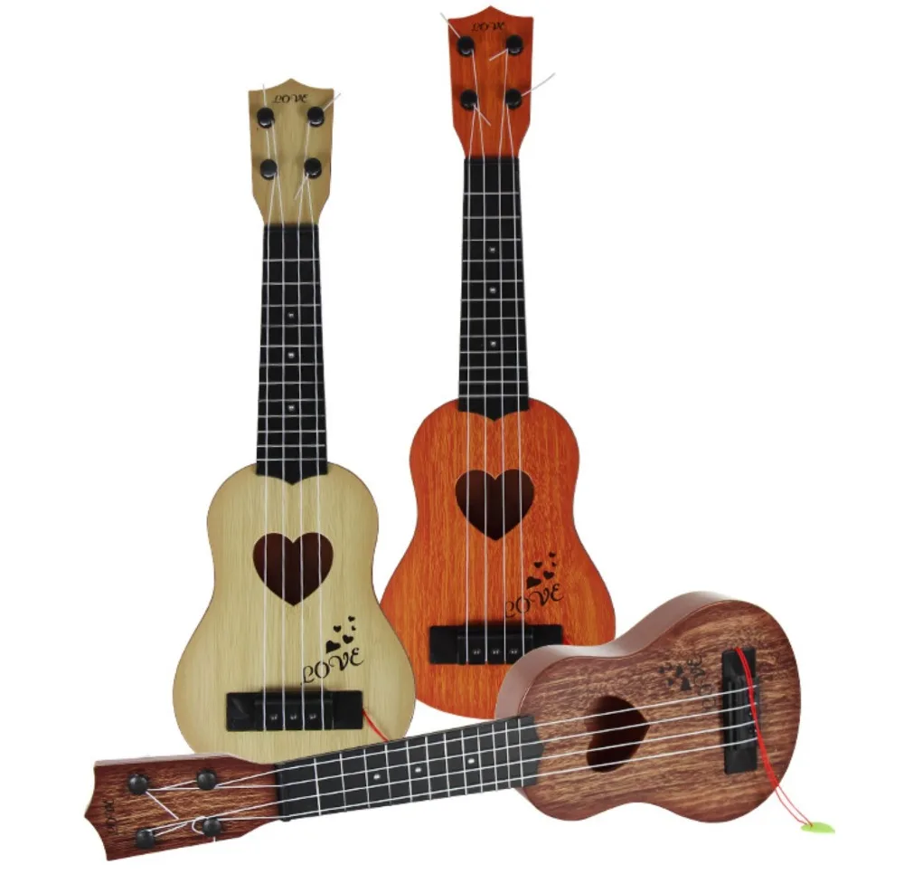 четыре струны. четырехструнная гитара укулеле. маленькая гитара укулеле 4 струны. зебра укулеле 21. электро укулеле 23 дюйма rosefinch.