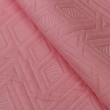 

New exquisite embossed diamond-shaped cotton jacquard fabrics include fashion lace dress pants DIY coat fabric wholesale