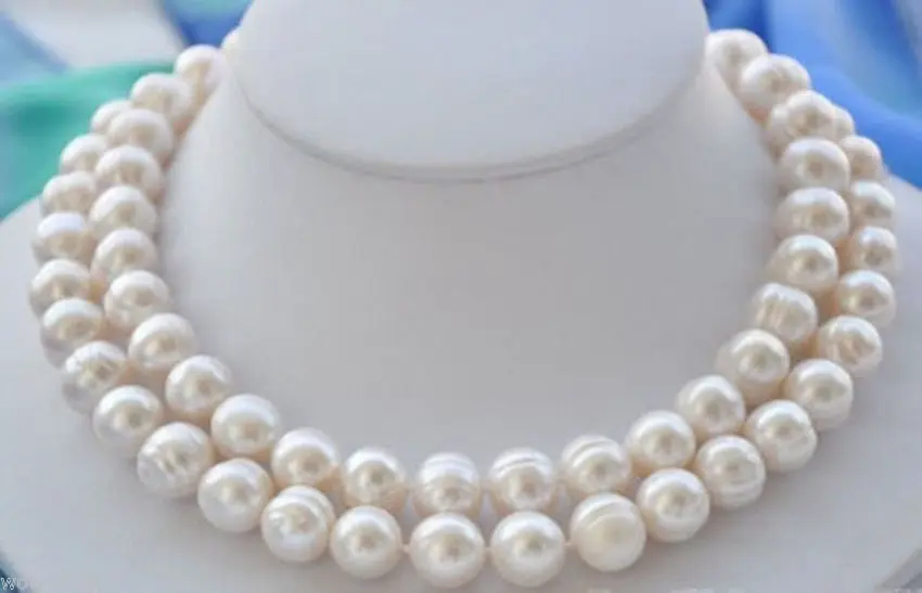 

FREE SHIPPINGNew 10-11mm white Freshwater Cultured Pearl necklace 32