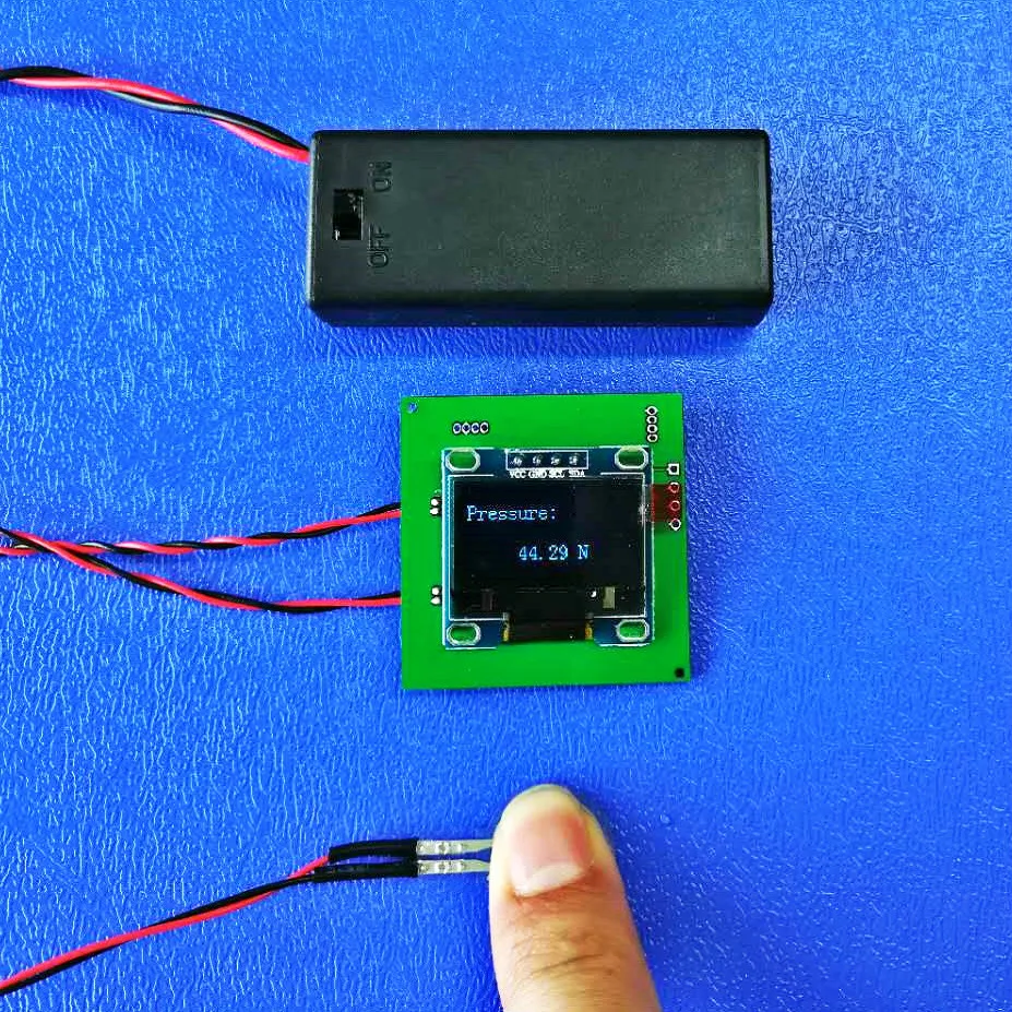 Force sensing thin film pressure sensor