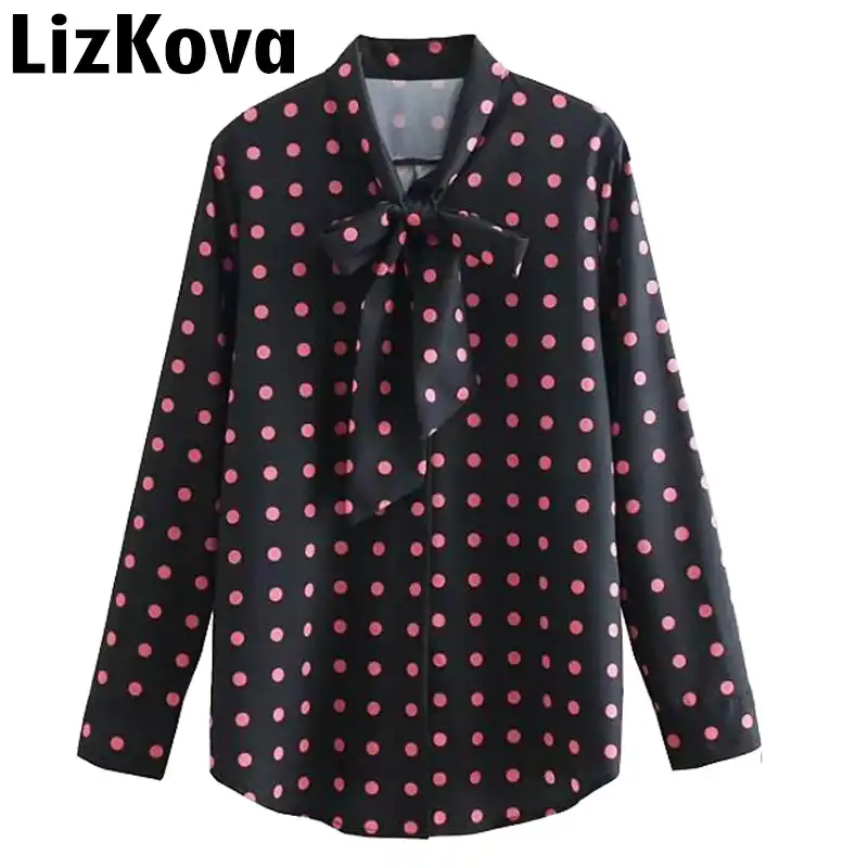 pink blouse with black polka dots