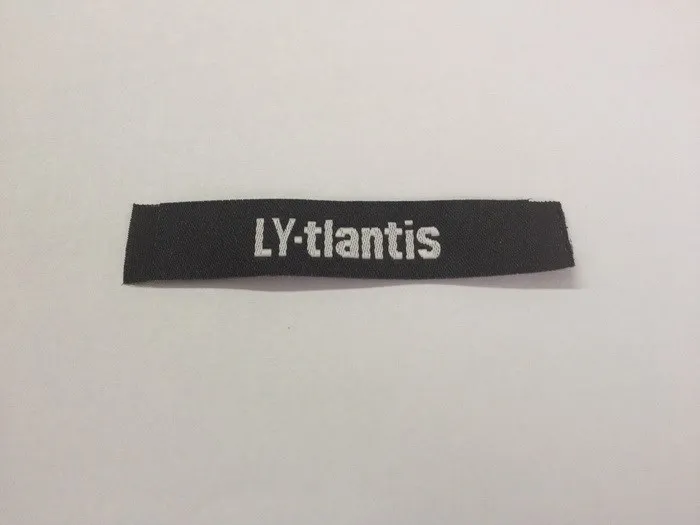 ly tlantis label