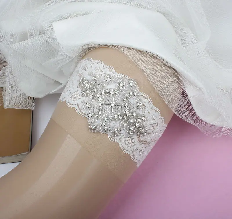 Оптовая Продажа Новый дизайн Свадебная подвязка Стразы Кружевная аппликация Свадебная подвязка ручной работы белого цвета