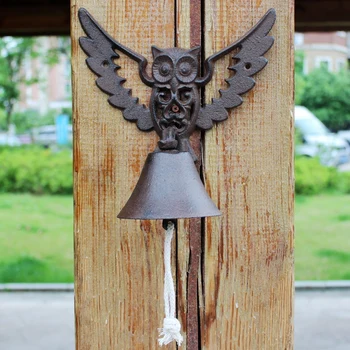 

Free shipping European Antique Restic Flying Owl Design Cast Iron Wall Decor Door Welcome Hand Cranking Bell