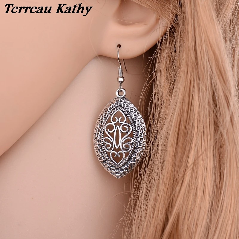 

Terreau Kathy Vintage Ethnic Plated Antique Silver Earring Wholesale Hollow Metal Pending Drop Earrings Women Jewelry