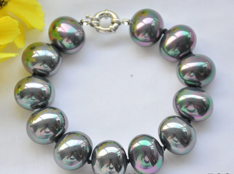 

Free shipping >>>>>> Z6915 8inch PEACOCK BLACK 20mm EGG SOUTH SEA SHELL PEARL BRACELET