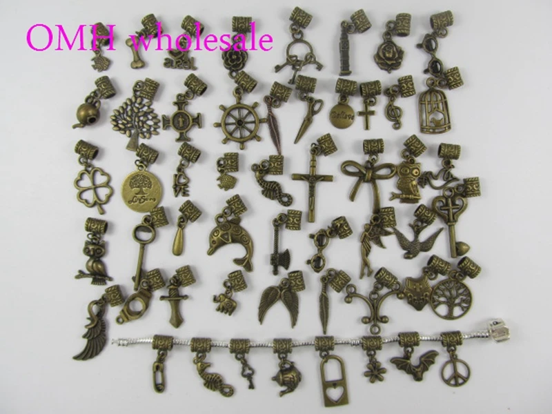 

OMH wholesale 20pcs 53styles random Mixed DIY alloy Craft Jewelry Accessories bronze charm European pendants for bracelet PJ368