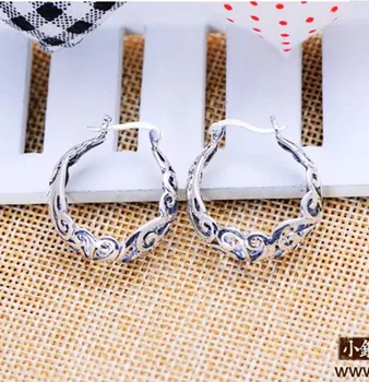 

KJJEAXCMY fine jewelry S925 Sterling Silver retro Thai silver hollowed pattern circles earrings, ladies ear studs, ear studs