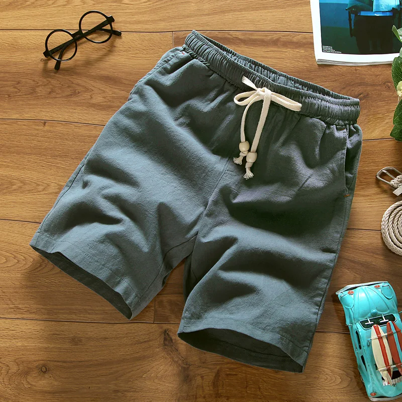 2018 summer New Fashion Mid Elastic Waist Loose Casual Solid Quality Summer New Flax Man Blue White Beach Thin Linen Men Shorts