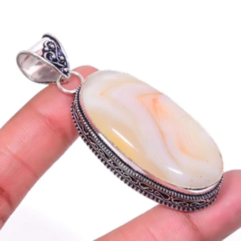 

Botswana Agates Antique Pendant Silver Overlay over Copper , 65 mm, P5473