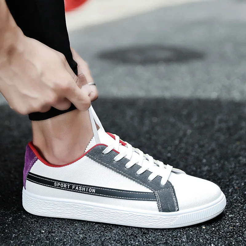 2019 الربيع و الخريف جديد عارضة تنفس حذاء قماش الاتجاه اللون مطابقة الدانتيل أحذية تزلج البريطانية البرية أحذية رجالي