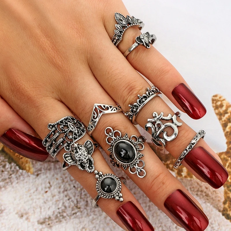 

Tibetan Antique Carved Black Stone Feather Crown Elephant Midi Rings Set Women