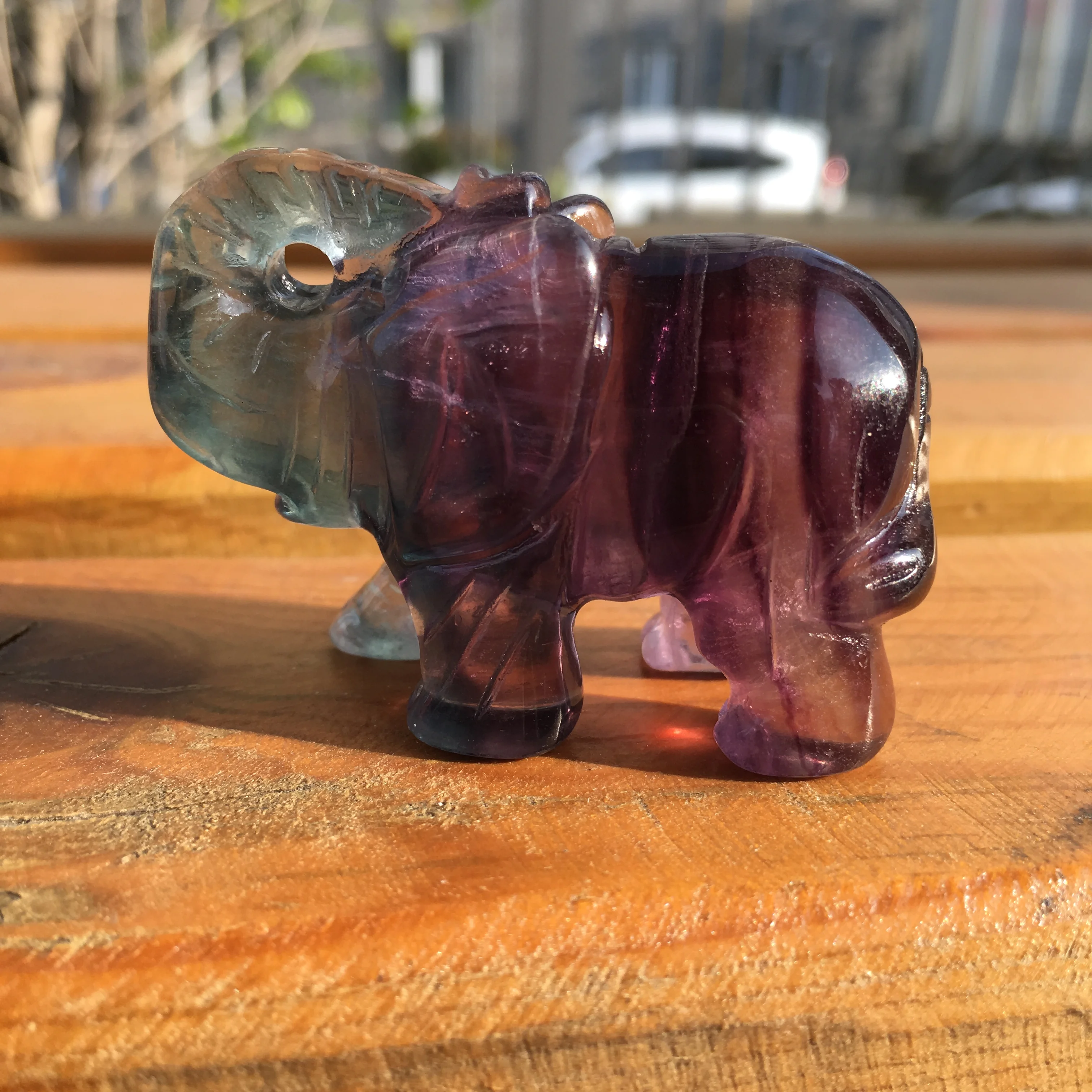 Cute hand-carved natural fluorite baby elephants as gifts and home decor