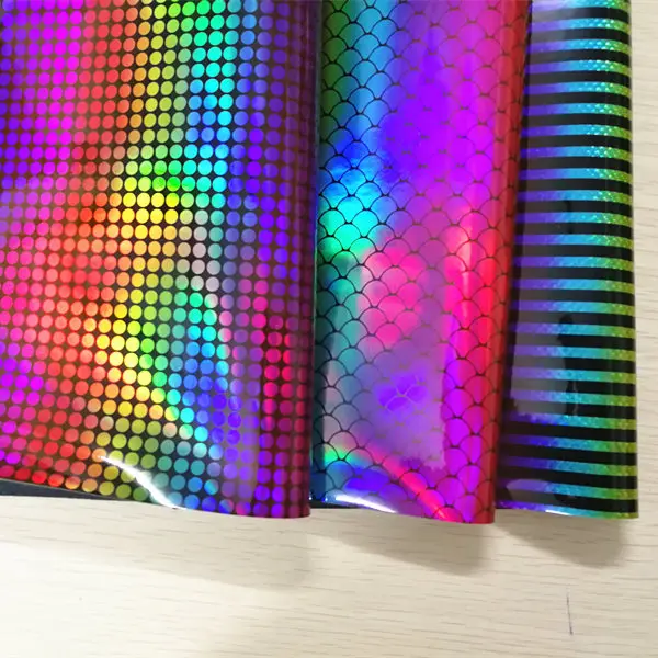 

Free shipping 1pcs/7.6*12inch synthetic hologram rainbow leather fabric for DIY accessories