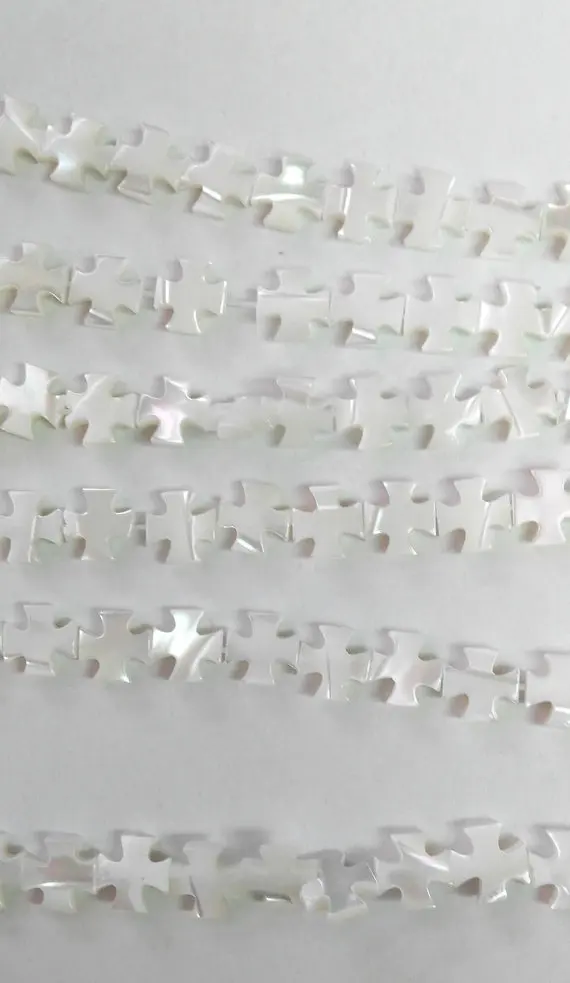 

gorgous shell beasd high quality 2strands 7-10mm Genuine MOP Shell ,Pearl Shell cross ,cross shell white ewelry beads